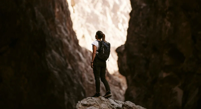 Female backpacker in a canyon