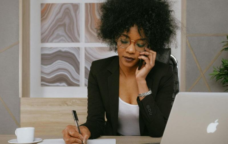 Saleswoman selling on the phone